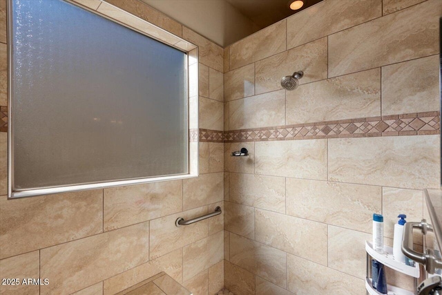 bathroom featuring tiled shower