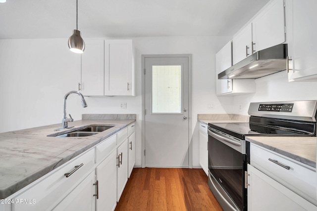 kitchen featuring pendant lighting, sink, dark hardwood / wood-style floors, stainless steel electric range oven, and white cabinetry