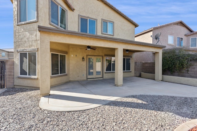 back of house with a patio and ceiling fan