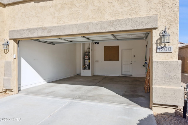 garage featuring water heater