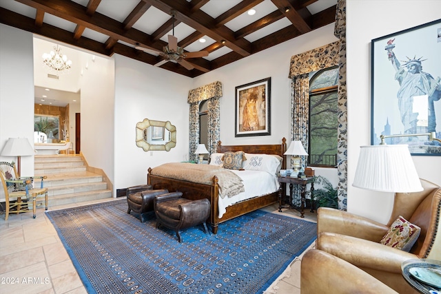 bedroom with coffered ceiling, a towering ceiling, a notable chandelier, and beamed ceiling