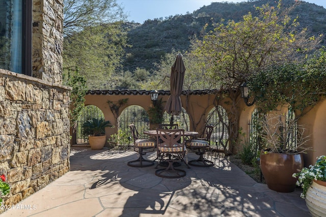 view of patio with a mountain view