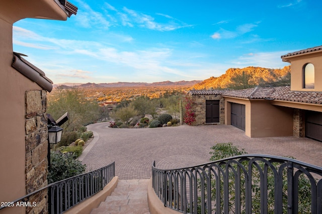 view of patio / terrace featuring a mountain view