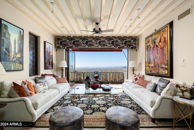 living room with ceiling fan and wooden ceiling