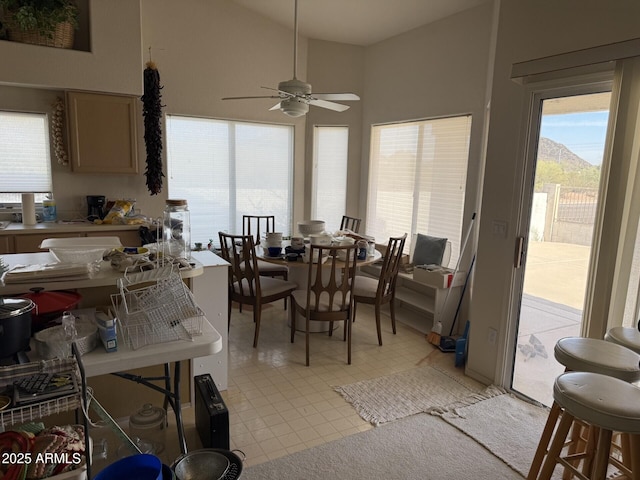 12955 E Sahuaro Dr, Scottsdale, AZ 85259 - dining space featuring ceiling fan and high vaulted ceiling