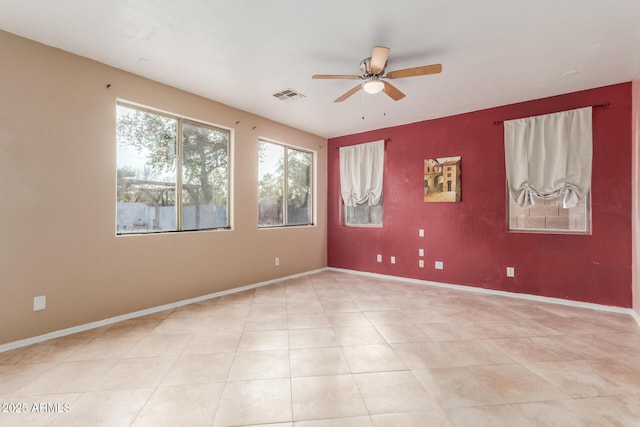 spare room featuring ceiling fan