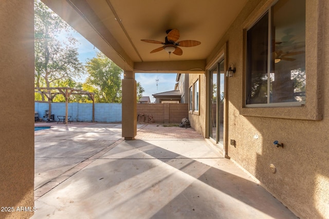 view of patio / terrace featuring ceiling fan