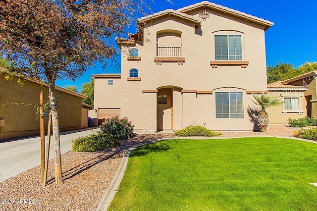 546 E San Carlos Way, Chandler, AZ 85249 - mediterranean / spanish house with stucco siding, a front yard, and a tile roof