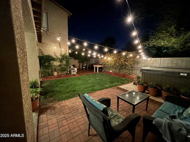 546 E San Carlos Way, Chandler, AZ 85249 - patio at twilight with a hot tub and a patio