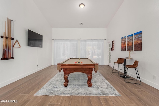 recreation room with billiards and light hardwood / wood-style flooring