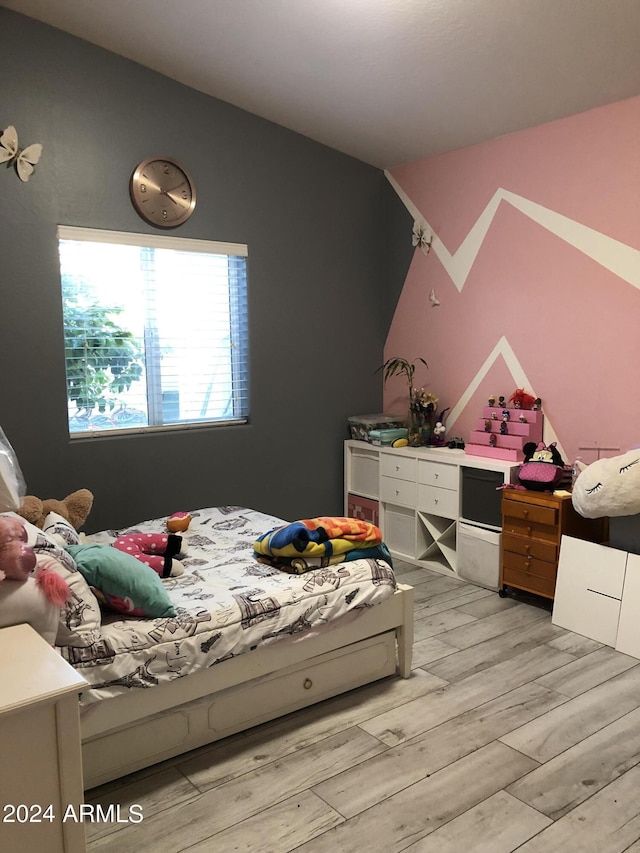 bedroom featuring light wood-type flooring