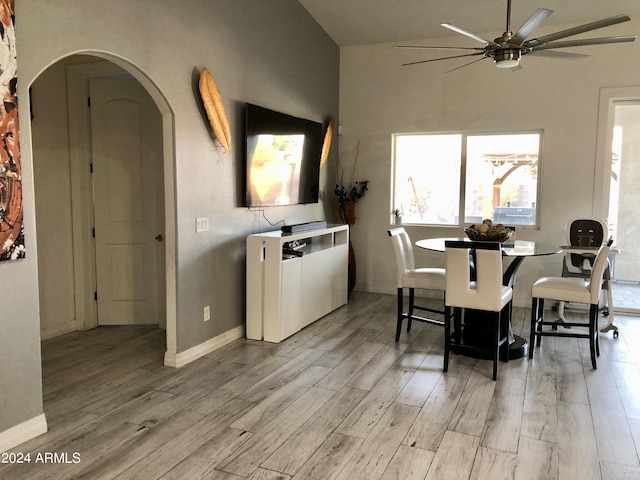 dining space with ceiling fan and light hardwood / wood-style floors