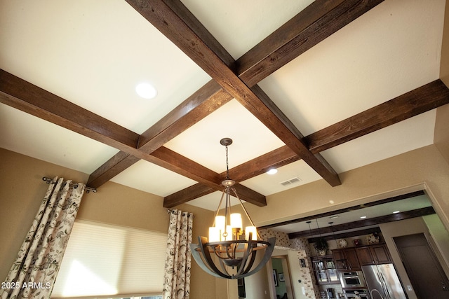 room details with a notable chandelier, coffered ceiling, stainless steel fridge, and beam ceiling