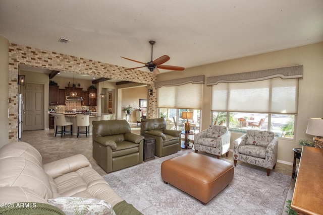 living room with ceiling fan