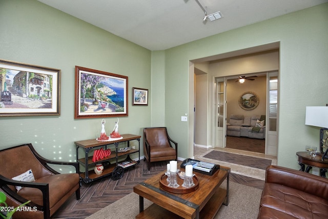 living room with dark parquet floors