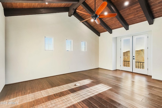 unfurnished room featuring french doors, wood ceiling, lofted ceiling with beams, ceiling fan, and hardwood / wood-style floors