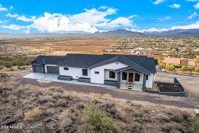 exterior space featuring a mountain view