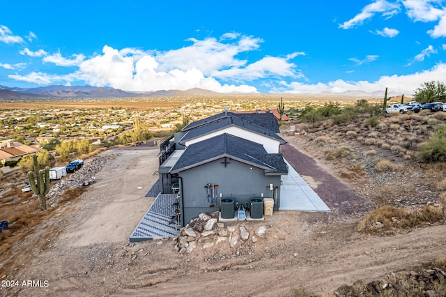 exterior space featuring a mountain view