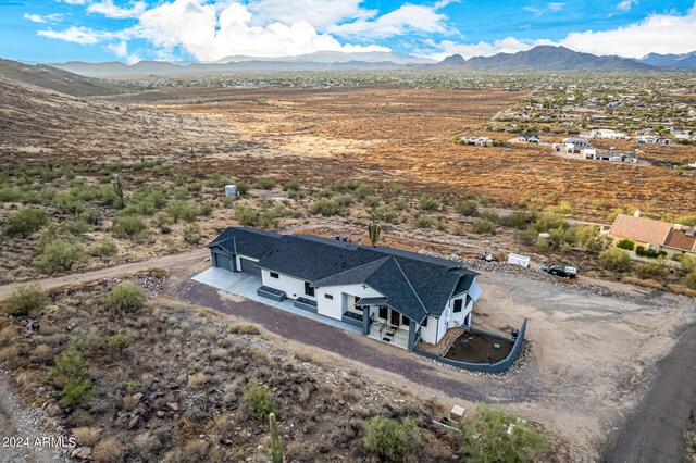 bird's eye view with a mountain view