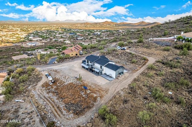 drone / aerial view featuring a mountain view