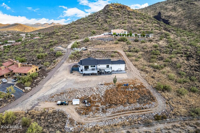 drone / aerial view featuring a mountain view