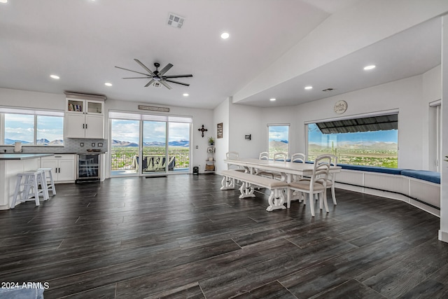 dining area with dark hardwood / wood-style floors and plenty of natural light