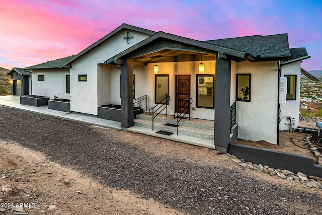 view of front facade with covered porch