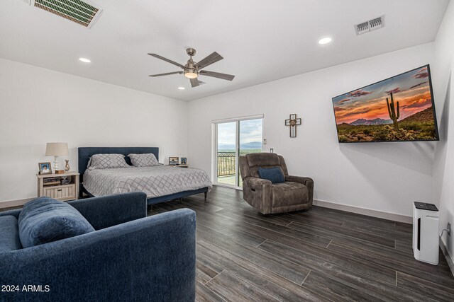 bedroom with access to outside, dark hardwood / wood-style floors, and ceiling fan