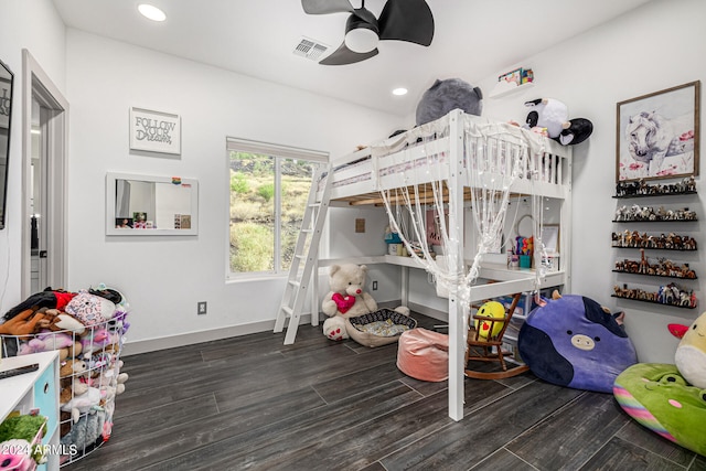 bedroom featuring ceiling fan and dark hardwood / wood-style flooring