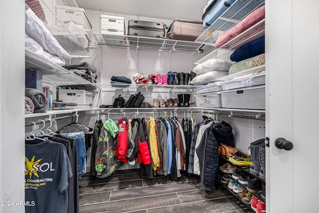 spacious closet featuring hardwood / wood-style flooring