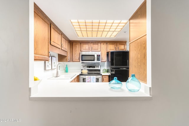 kitchen featuring sink and appliances with stainless steel finishes