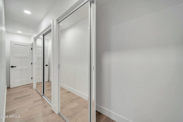 hall featuring light hardwood / wood-style flooring