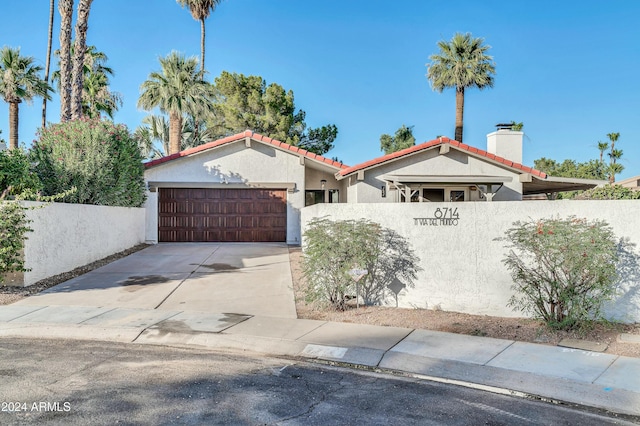 view of front of home featuring a garage