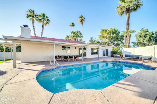 view of swimming pool featuring an outdoor hangout area and a patio area