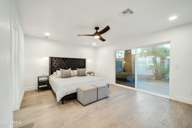 bedroom featuring ceiling fan, access to exterior, and light wood-type flooring