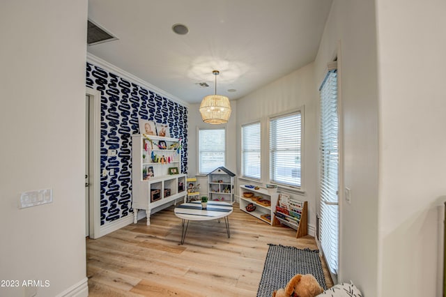 22406 S 173rd Way, Gilbert, AZ 85298 - playroom with wood finished floors and a chandelier