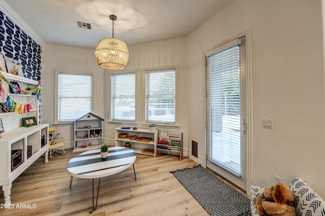 22406 S 173rd Way, Gilbert, AZ 85298 - rec room featuring wood finished floors, healthy amount of natural light, and a chandelier