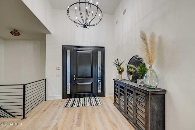 22406 S 173rd Way, Gilbert, AZ 85298 - entrance foyer with a high ceiling, a chandelier, and wood finished floors