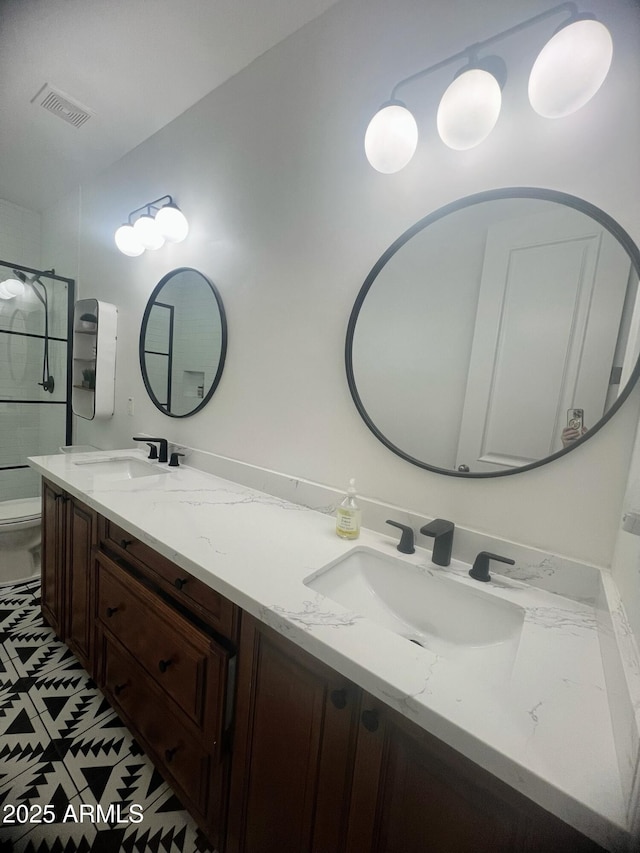 22406 S 173rd Way, Gilbert, AZ 85298 - bathroom featuring double vanity, a shower, and tile patterned floors