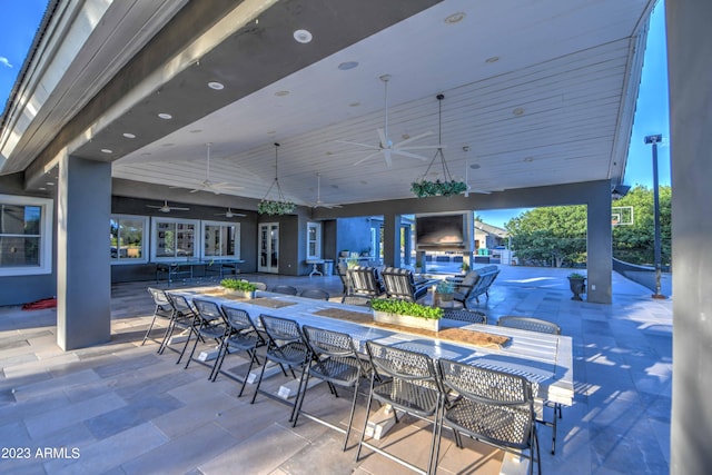 22406 S 173rd Way, Gilbert, AZ 85298 - view of patio with ceiling fan, an outdoor living space with a fireplace, an outdoor bar, and outdoor dining space