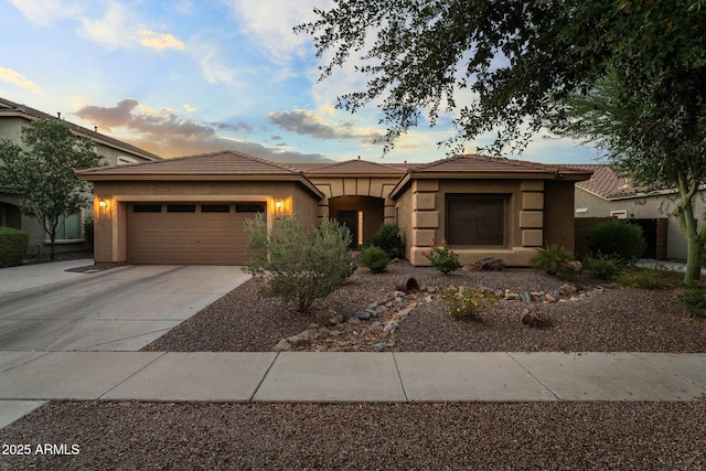 3018 E Vernon St, Gilbert, AZ 85298 - view of front of home featuring concrete driveway, stucco siding, a garage, and a tiled roof