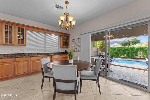 3018 E Vernon St, Gilbert, AZ 85298 - dining room featuring a chandelier and light tile patterned floors