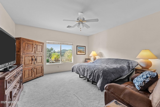 3018 E Vernon St, Gilbert, AZ 85298 - bedroom featuring light colored carpet and a ceiling fan