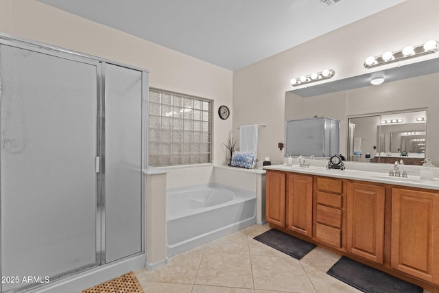 3018 E Vernon St, Gilbert, AZ 85298 - full bathroom with a shower stall, double vanity, tile patterned flooring, and a garden tub