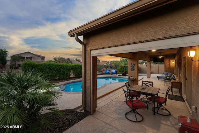 3018 E Vernon St, Gilbert, AZ 85298 - pool at dusk featuring a patio and a fenced backyard