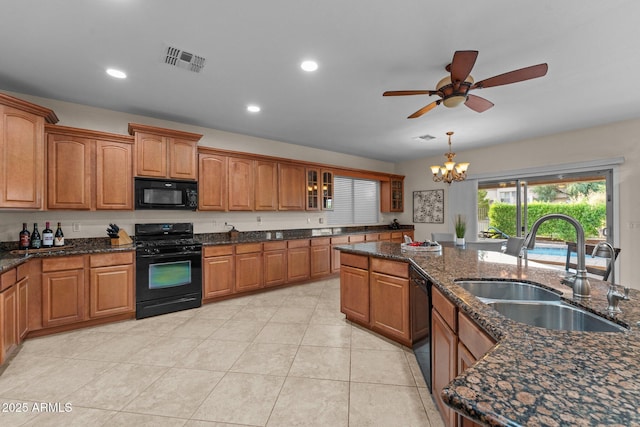 3018 E Vernon St, Gilbert, AZ 85298 - kitchen with black appliances, brown cabinets, ceiling fan, glass insert cabinets, and recessed lighting