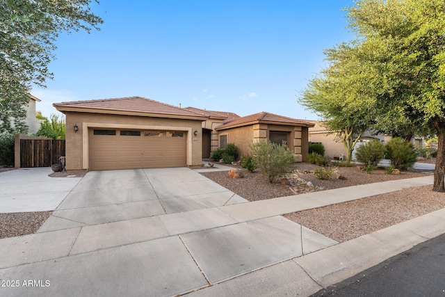 3018 E Vernon St, Gilbert, AZ 85298 - view of front of property with stucco siding, concrete driveway, a garage, and a tiled roof