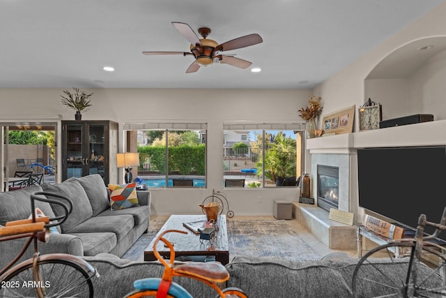 3018 E Vernon St, Gilbert, AZ 85298 - living area with a tiled fireplace, ceiling fan, and recessed lighting