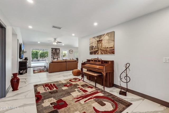 5101 E Paradise Dr, Scottsdale, AZ 85254 - living area with light marble finish floors, recessed lighting, and ceiling fan