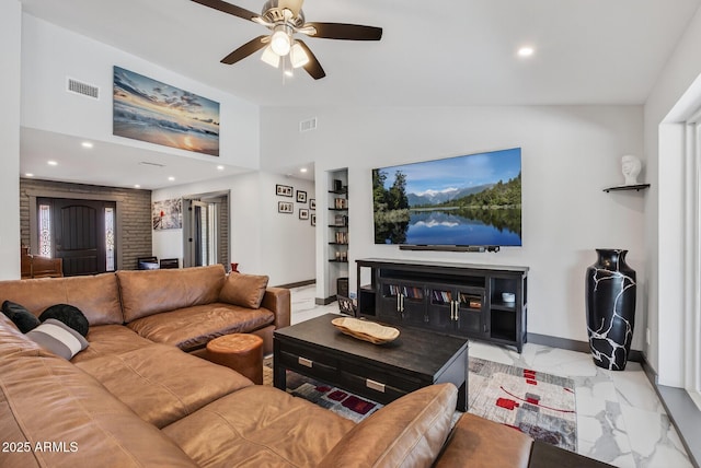 5101 E Paradise Dr, Scottsdale, AZ 85254 - living area with lofted ceiling, ceiling fan, marble finish floors, and recessed lighting